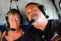 Dianne & Jim in the helicopter in Grand Cayman
