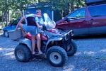 Dianne getting on the 4 wheeler & Donna